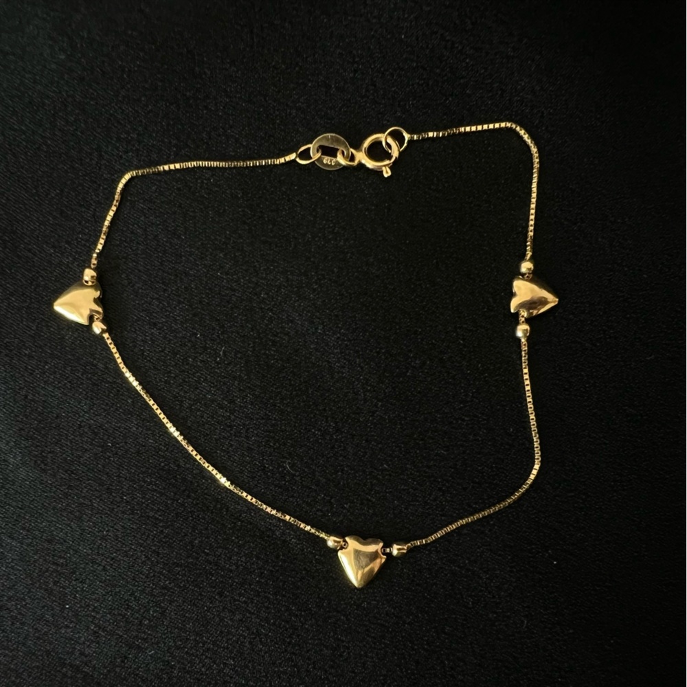 14K yellow gold heart charm bracelet